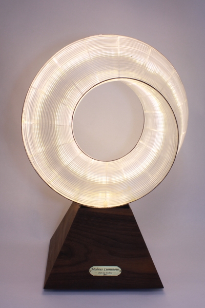 Very unique lighted sculpture called Mobius luminous part of the Journey collection